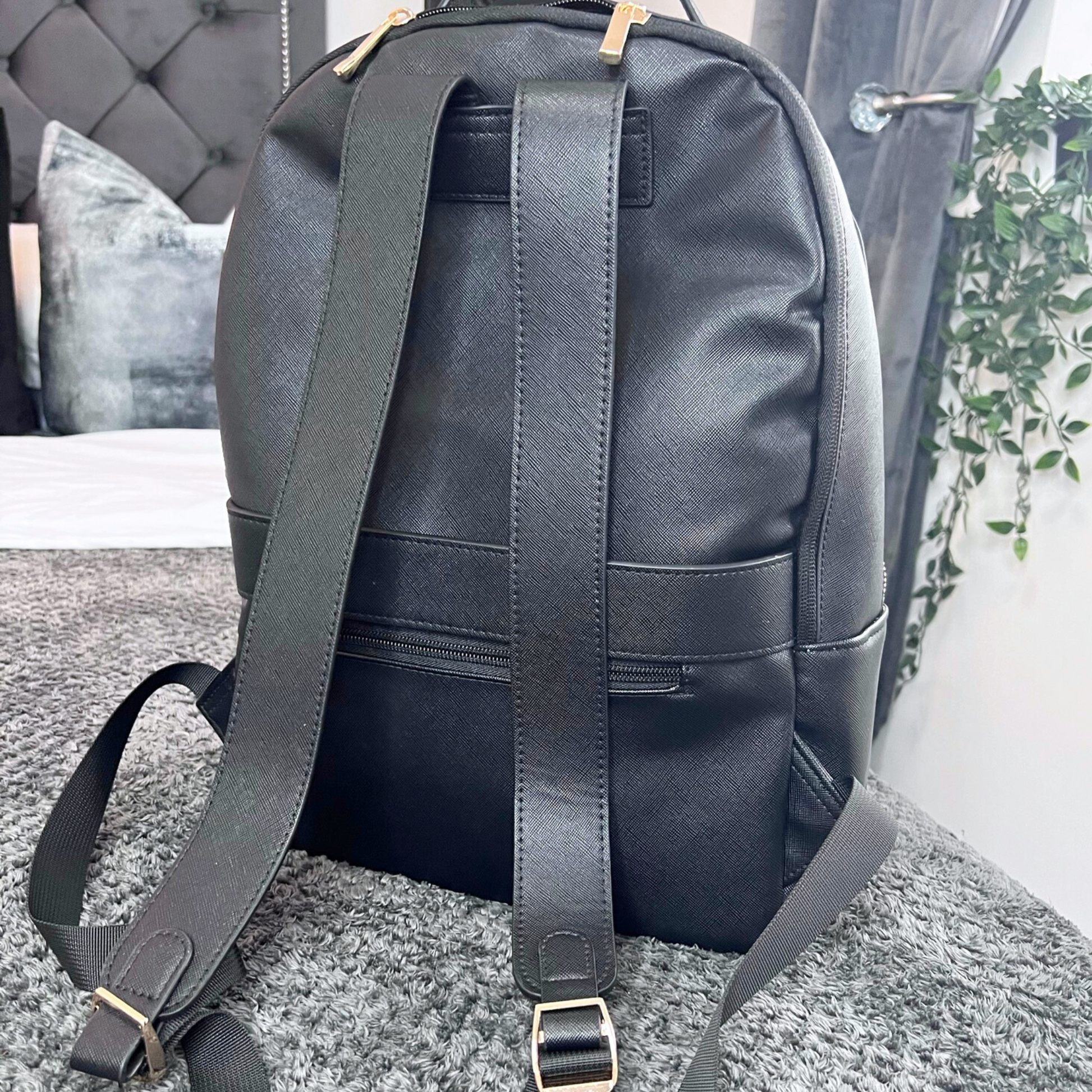 DETAILS OF LUXURY INITIAL BACK PACK BLACK