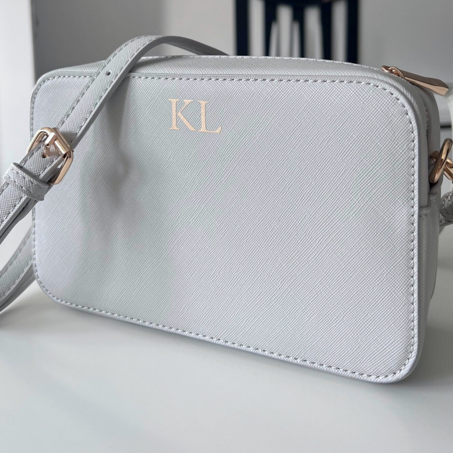 MONOGRAMMED CROSS BODY BAG LIGHT GREY