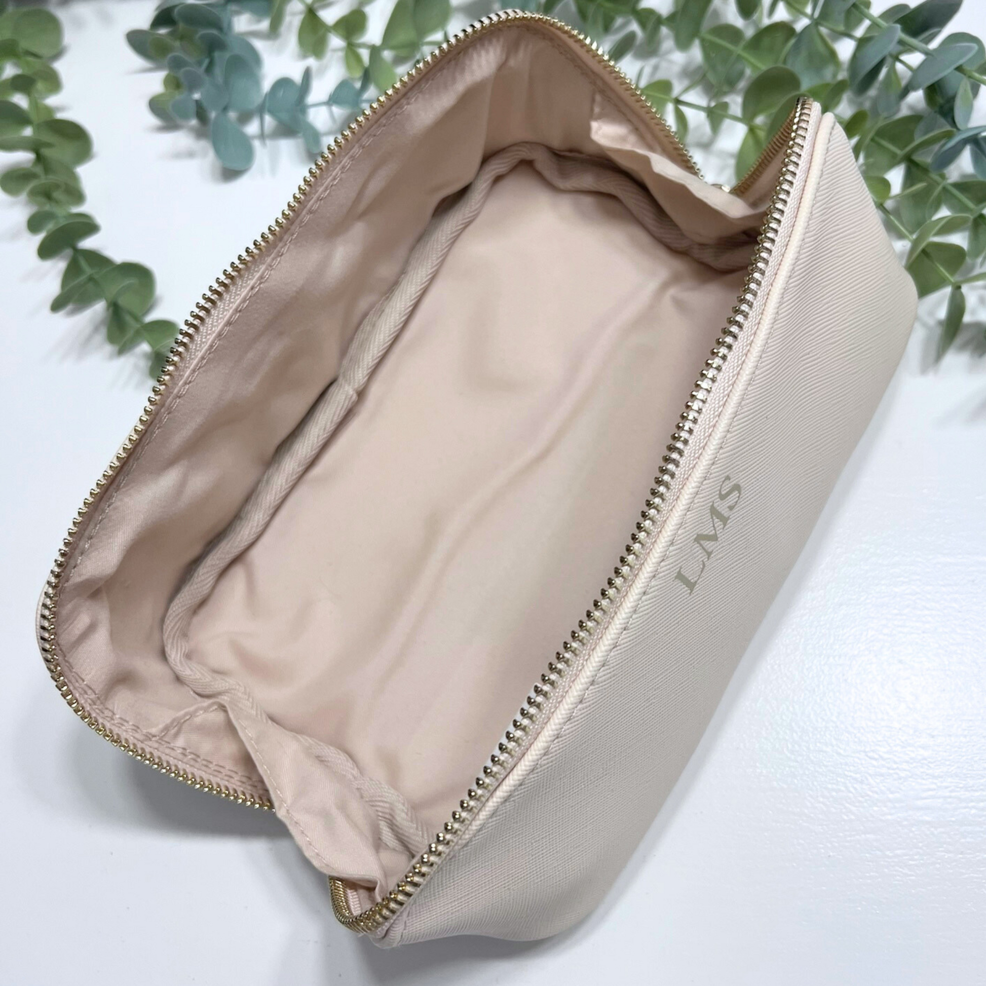 INSIDE OF OYSTER FLAT LAY MINI MAKE UP BAG