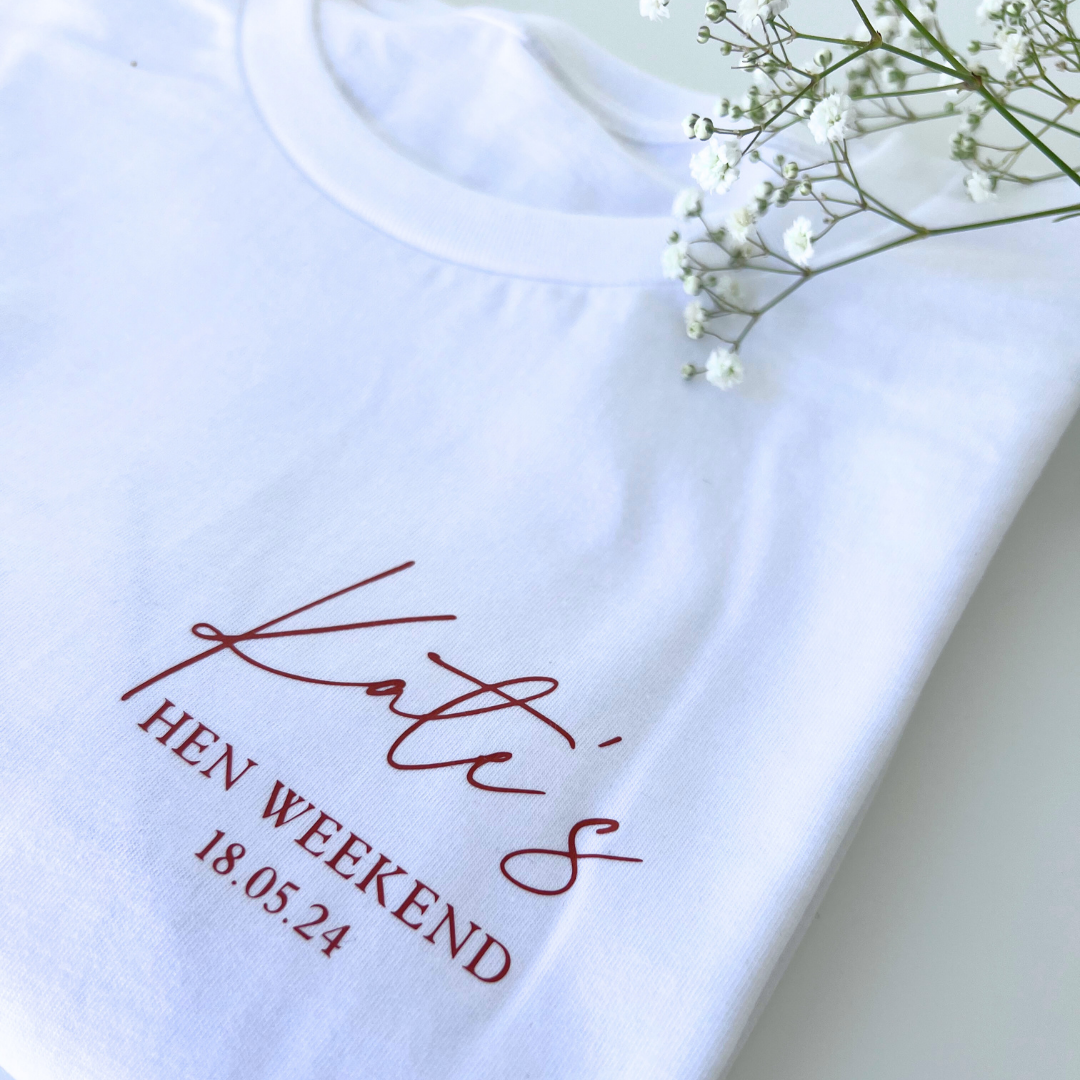 WHITE HEN PARTY T-SHIRT PERSAONALISED WITH BRIDES NAME AND DATE OF HEN WEEKEND 